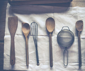 Directly above shot of kitchen objects on fabric