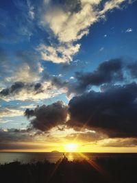 Scenic view of dramatic sky during sunset