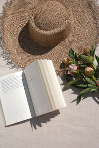 High angle view of open book on table