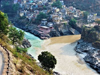 Devaprayag, the confluence of two chief tributaries of ganga - muddy alakananda and blue bhagirathi. 