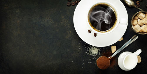 High angle view of coffee cup on table