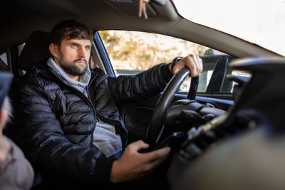 Man driving car