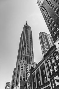 Low angle view of office building against sky