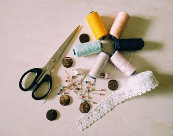 High angle view of various buttons on table