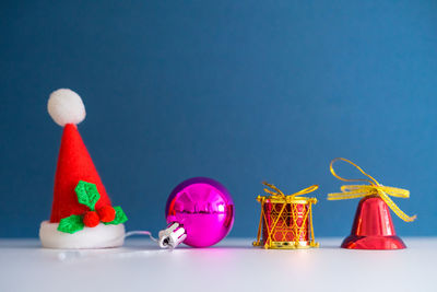 Close-up of christmas decoration against blue background
