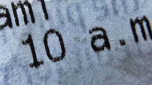 Close-up of text on snow