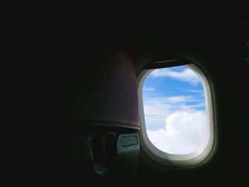 View of airplane wing seen through window