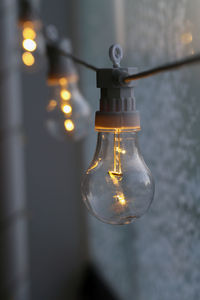 Close-up of illuminated light bulb