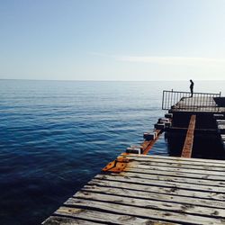 Empty jetty leading to sea