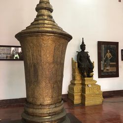 Statue of temple against building