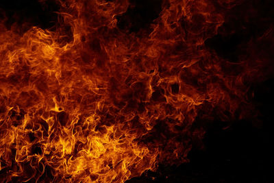 Close-up of fire in the dark