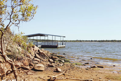 Scenic view of beach against clear sky