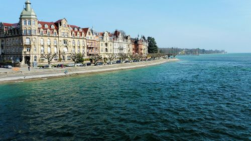 Scenic view of sea against clear blue sky