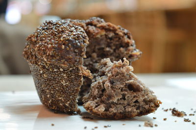 Close-up of nut cake with sesame seeds on table