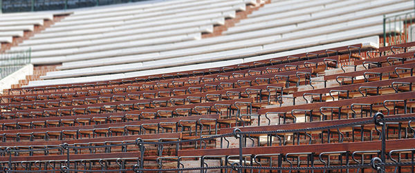 Detail of a spanish plaza de toros with wooden seats