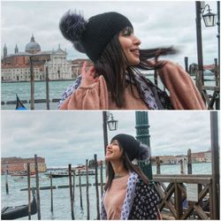 Young woman smiling while standing in city