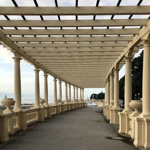 Empty corridor along buildings