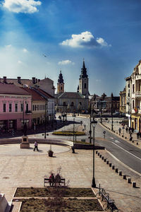 Buildings in city against sky