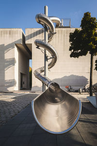 Spiral water slide against sky