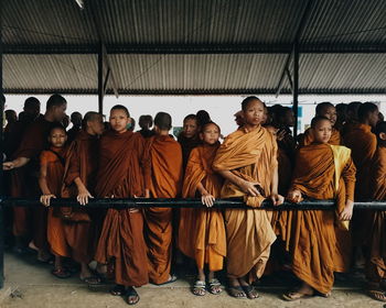 Monks standing in temple