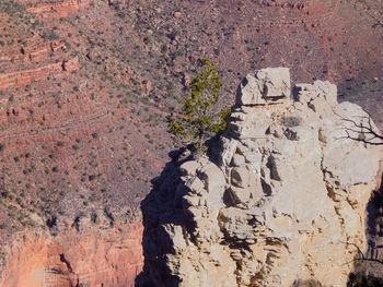 Shadow of man on rock formation