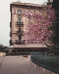 View of building and street against sky