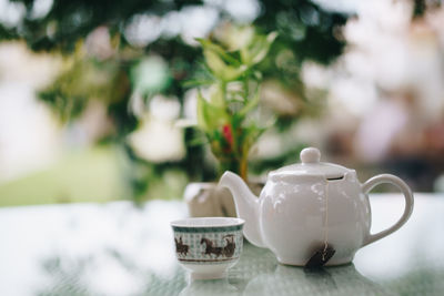 Close-up of coffee cup on table