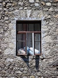 View of old window on building wall