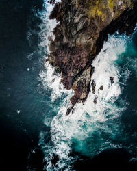 High angle view of rocks in sea ireland