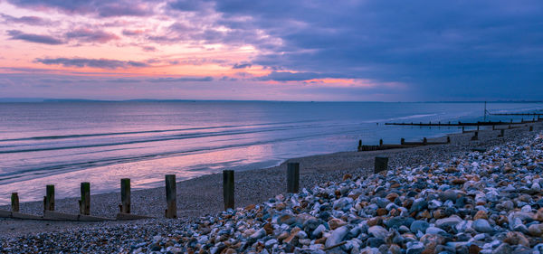 Scenic view of sea against sky during sunset