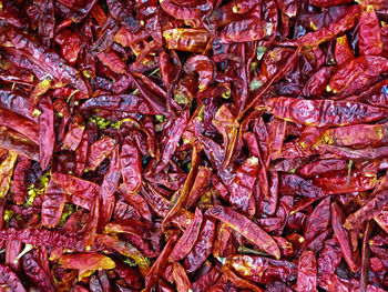 Full frame shot of dry red chili peppers for sale at market stall