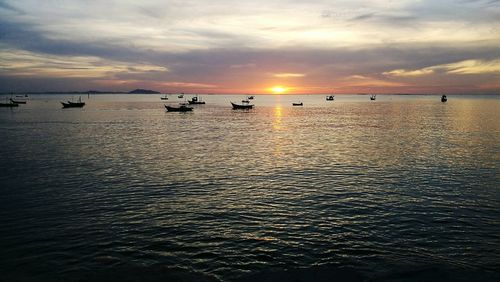 Scenic view of sea against dramatic sky