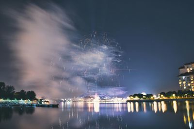Reflection of illuminated buildings in water