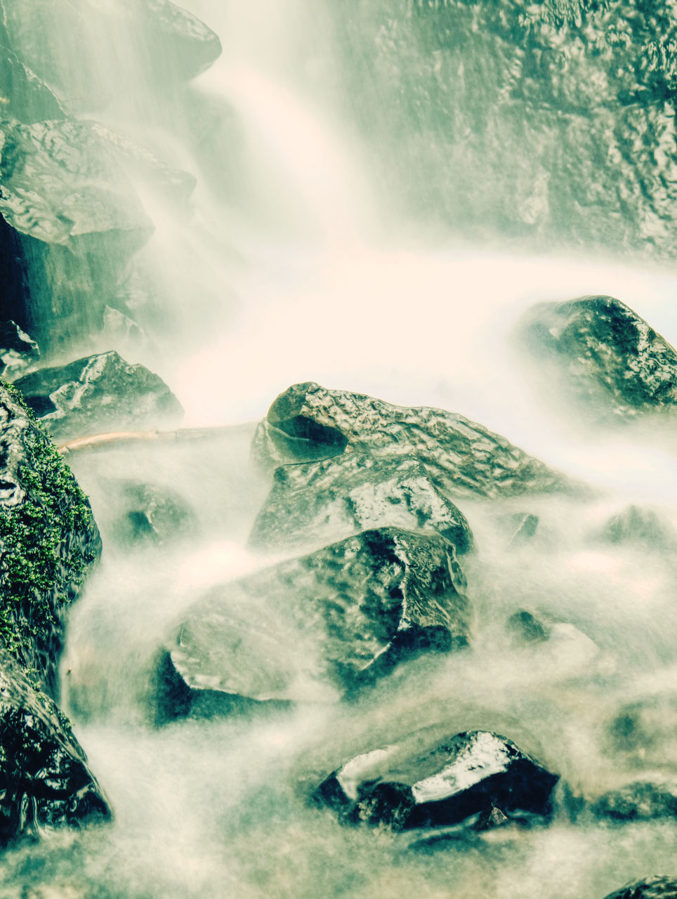 CLOSE-UP OF WATERFALL WITH ICE