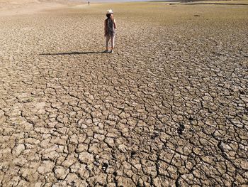 High angle view of woman standing on land