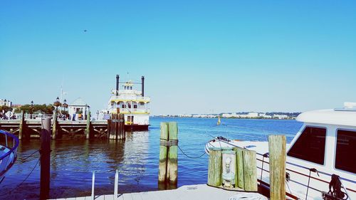 Commercial dock against clear blue sky