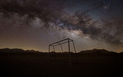 Playing ground against sky at night