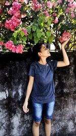 Full length of girl with flowers