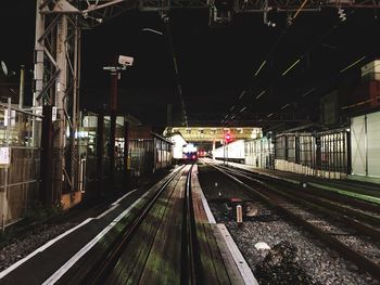 Railroad station platform at night