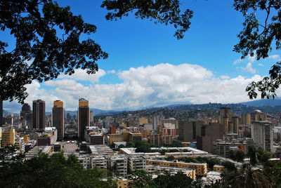 Buildings in city against sky