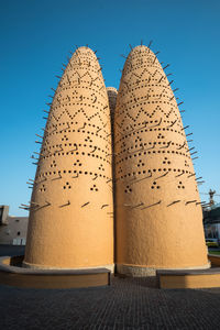 Low angle view of built structure against clear sky