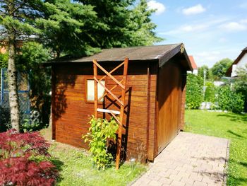 House with trees in background