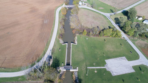 High angle view of road amidst field