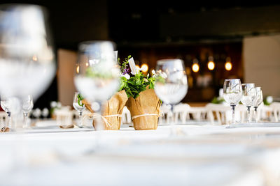 Luxury table settings for fine dining with and glassware, beautiful blurred background. 