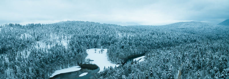 Aerial view of landscape against sky during winter