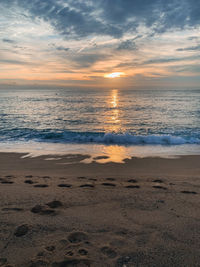 Scenic view of sea against sky during sunset