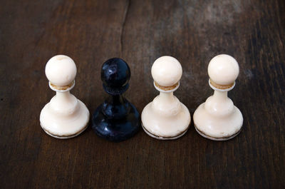 Close-up of chess piece on table