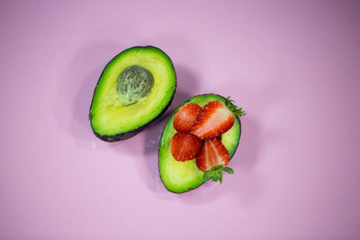 Close-up of fruit against white background