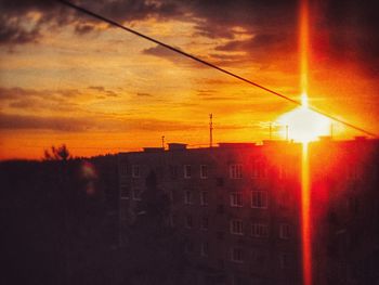 Silhouette of buildings at sunset