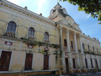 Low angle view of historical building against sky